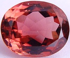 Peach oval tourmaline gemstone, exclusive loose faceted tourmalines, Madagascar gemstones shopping